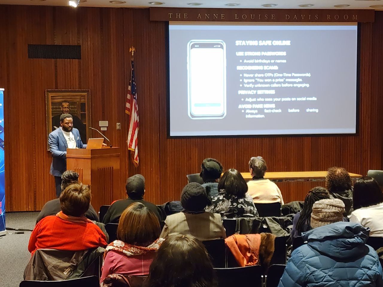 I-TECH GLOBAL PROJECTS founder presenting an online safety class to seniors at The Anne Louise Davis Room
